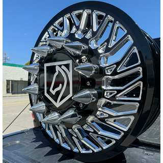 Inferno VNM Forged dually wheels with floating billet caps and billet spikes in black machine finish, fitting Ford and Chevy DRW models