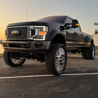 Ford F-450 30 inch wheels the argo style by VNM Forged 42 inch tires fury lifted diesel truck floating caps venum wheel billet caps spikes 30x8.25 dual wheel truck