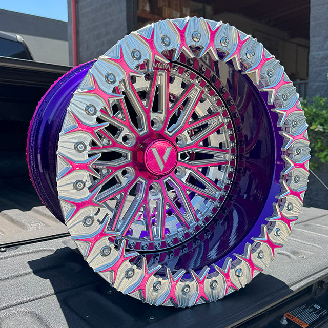 side by side wheels in prismatic illusion purple illusion pink wtih AR-2 beadlock  rims. floating caps 17x14 wide for can am maverick r 6 lug