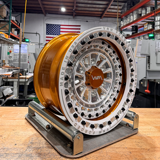 Can Am Maverick R Wheels by VNM Forged V-7 Style in Flaming Gold With white beadlock and powder coated milled face. Black Bolts billet center cap for off road vehicle 6x5.5 bolt pattern side by side off road buggy