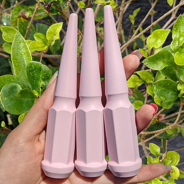 flat pink spike lug nuts.jpg__PID:26eef532-3a61-4219-8000-9ab586d3f4df