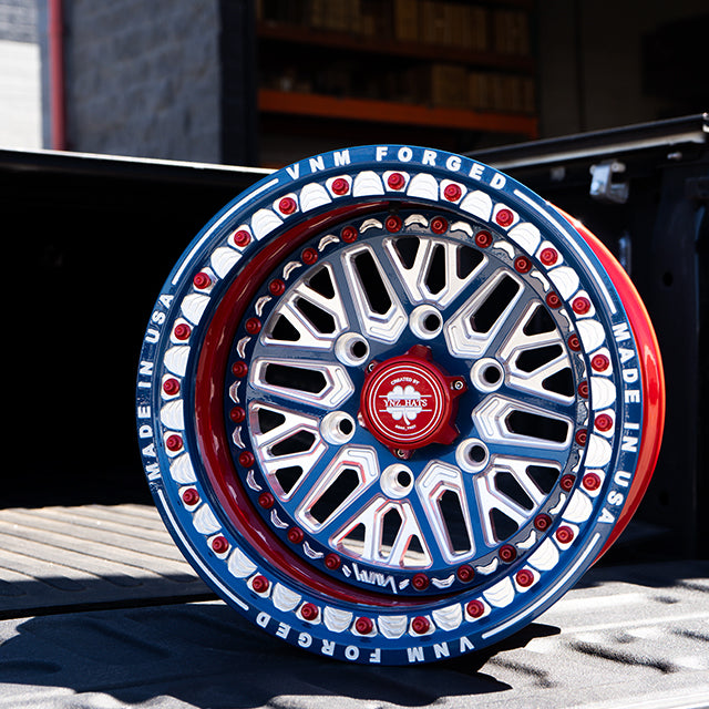 maverick r rim beadlock , forged wheels , can am maverick in dusty navy and legion red v-1 the argo utv wheels