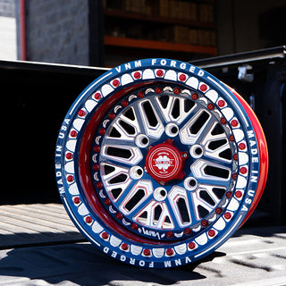 maverick r rim beadlock , forged wheels , can am maverick in dusty navy and legion red v-1 the argo utv wheels