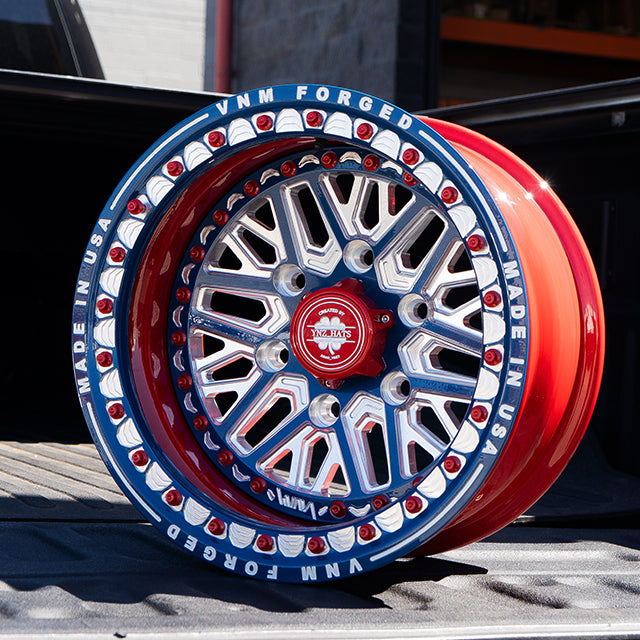 vnm forged the argo in dusty navy and legion red for can maverick r wheels, billet wheels, utv rims, utv wheels
