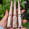 24 pc 14x1.5 candy rose gold spike lug nuts 4.5" tall powder coated durable coating