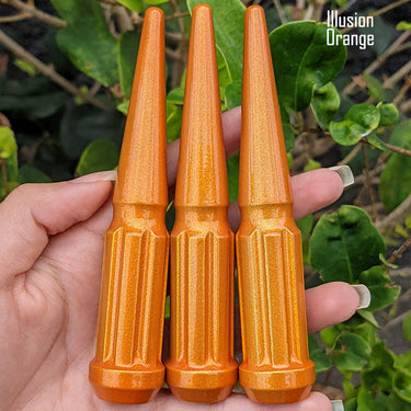 32 pc 9/16-18 illusion orange spike spline lug nuts 4.5" tall powder coated durable coating prismatic powder coating